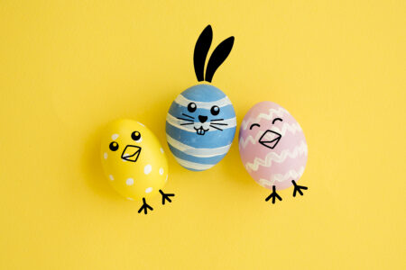 colorful-easter-eggs-yellow-background